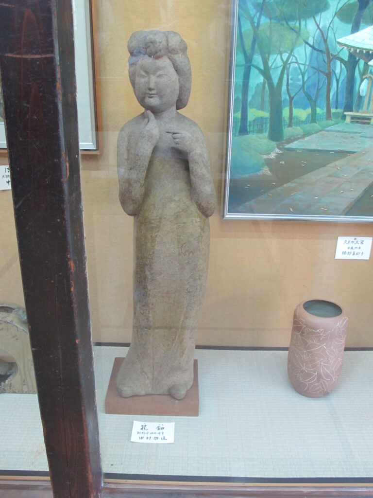 田村興造